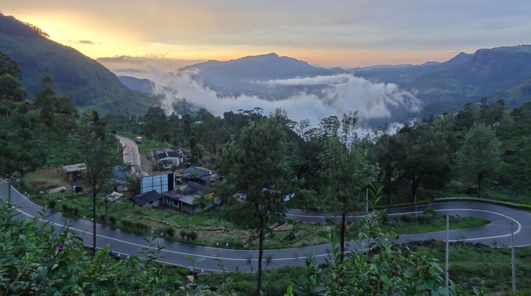 The road from Kandy to Nuwara Eliya is full of turns, deceptively long and passes some of the largest tea plantations in the world. Truth be told, driving anywhere in the hill country of Sri Lanka is an exercise in patience given that even short distances can take hours due to slow moving traffic, poor weather or less than desirable roads.
Better then to sit back and enjoy the ride while stopping for the occasional picture. (as we did for this cloudy sunset)