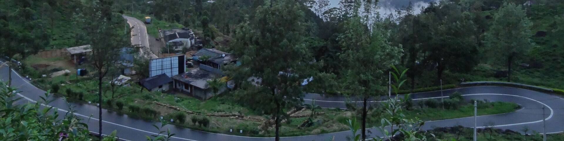 The road from Kandy to Nuwara Eliya is full of turns, deceptively long and passes some of the largest tea plantations in the world. Truth be told, driving anywhere in the hill country of Sri Lanka is an exercise in patience given that even short distances can take hours due to slow moving traffic, poor weather or less than desirable roads.
Better then to sit back and enjoy the ride while stopping for the occasional picture. (as we did for this cloudy sunset)