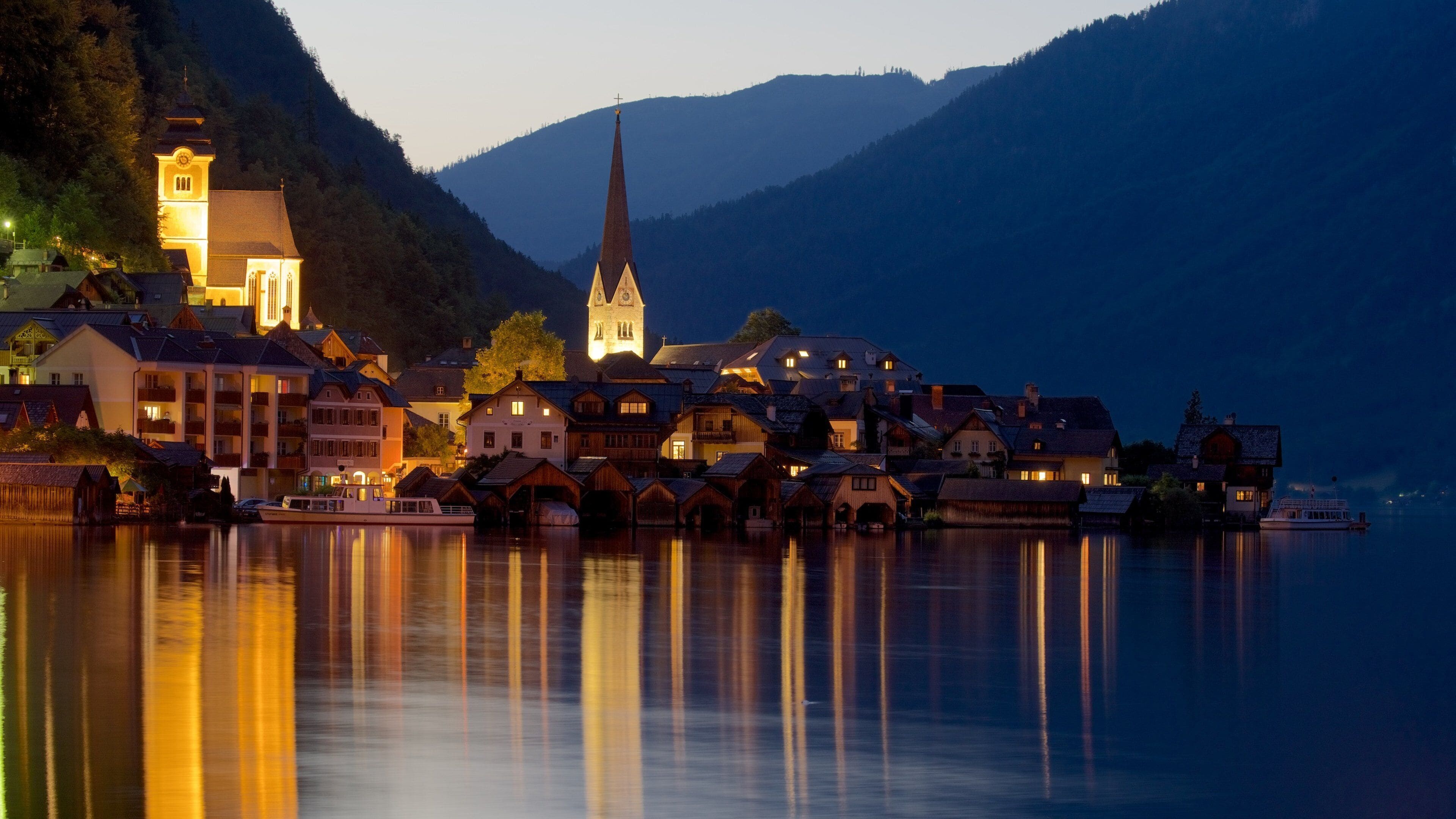 Upper Austria which includes a lake or waterhole and night scenes