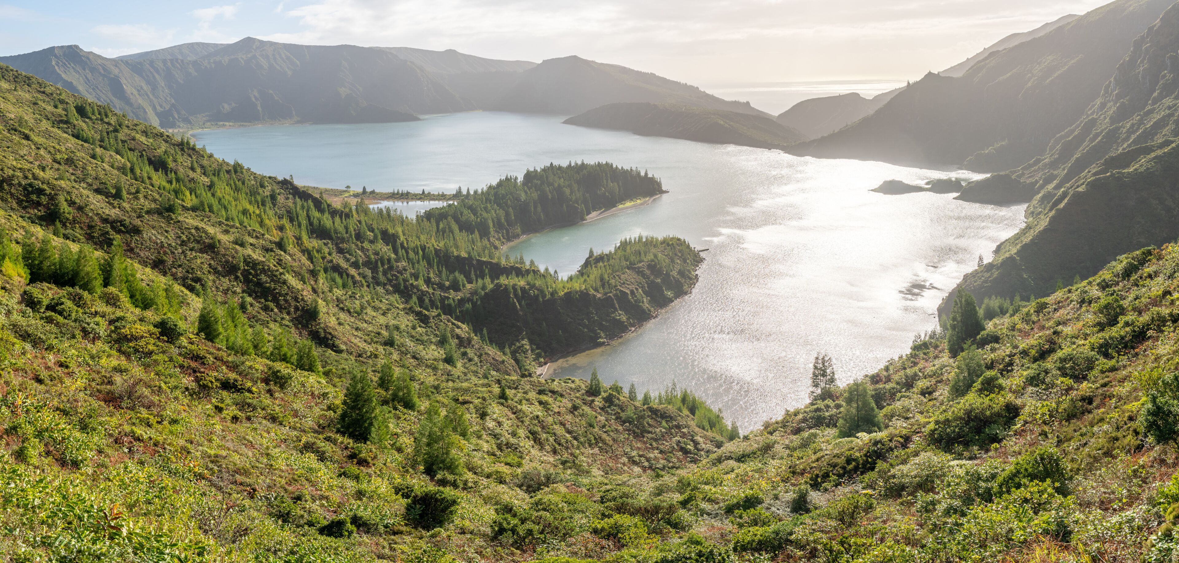 Lagoa do Fogo (Fire Lagoon) with sunlight hitting the water, São Miguel, Azores, Portugal
