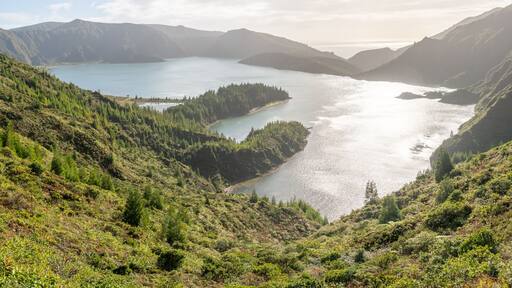 Lagoa do Fogo (Fire Lagoon) with sunlight hitting the water, São Miguel, Azores, Portugal