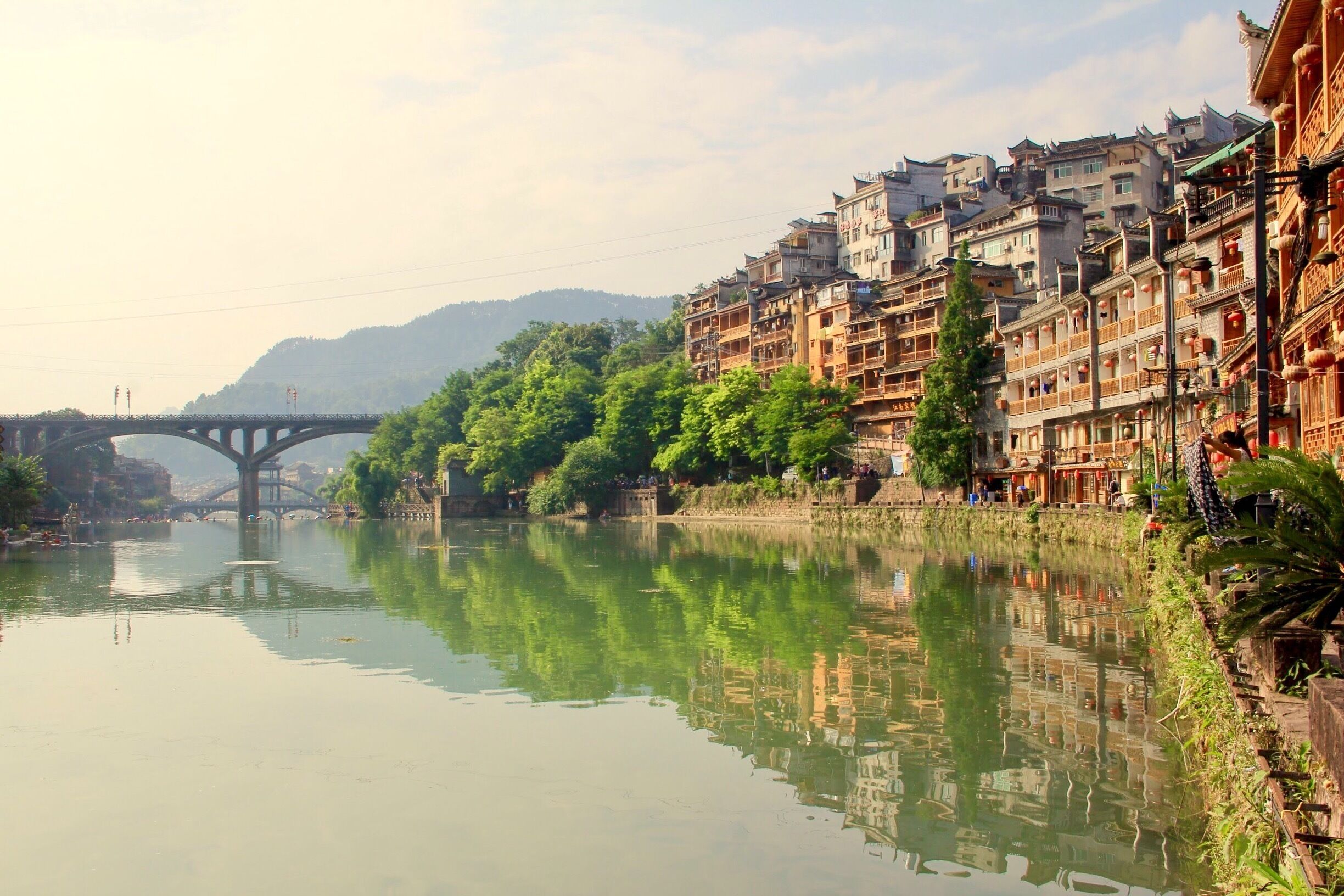 Mist covered the river at the Phoenix ancient town in China #reflections #ancient #travel #water #landscape #nature #nationalpark #China #Asia #hiking #architecture 