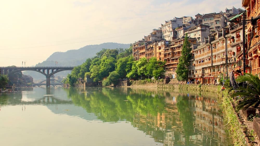 Mist covered the river at the Phoenix ancient town in China #reflections #ancient #travel #water #landscape #nature #nationalpark #China #Asia #hiking #architecture