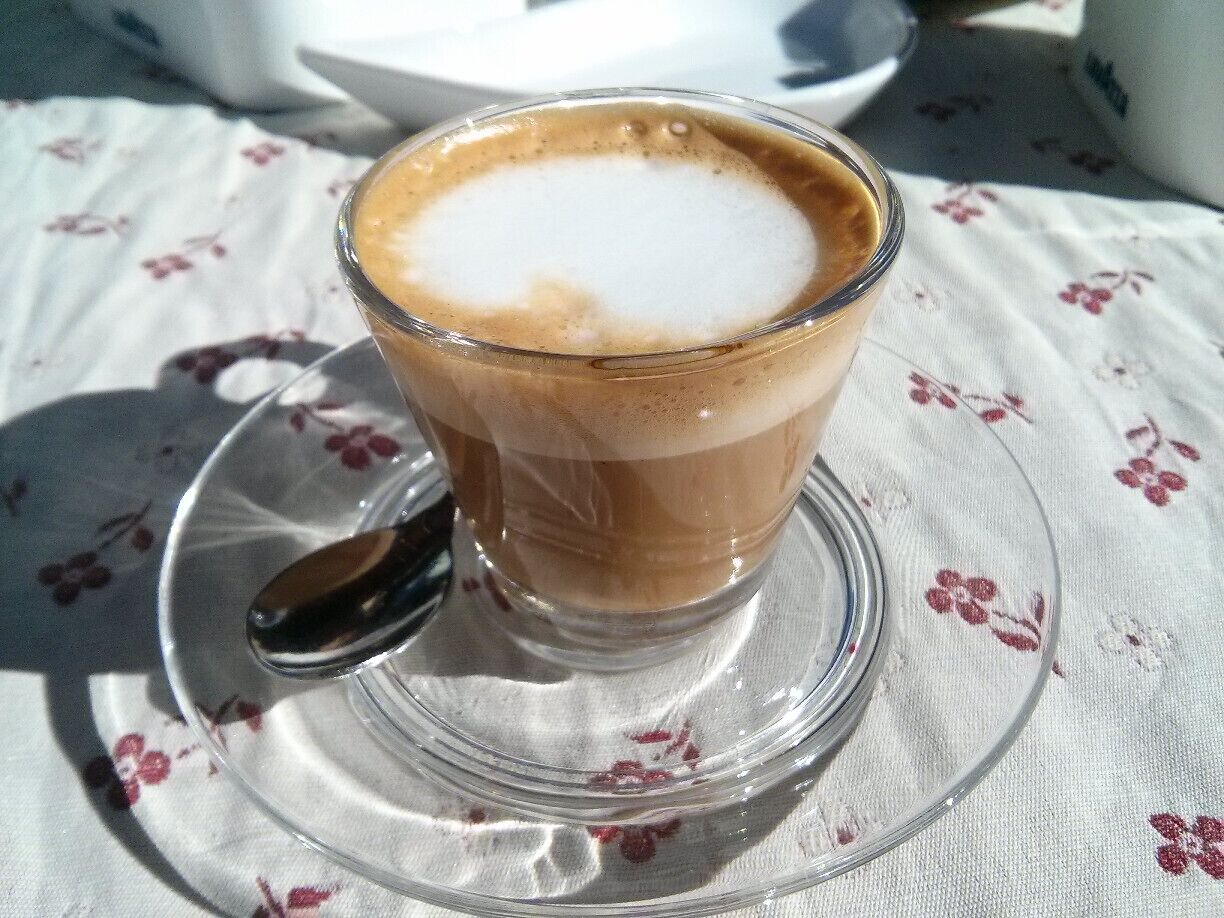 Driving into Italy on the Briançon-Torino road, Claviere is the first town after the border. You won't regret stopping for macciato and cornetti at Il Vecchio Cambio, the visual achievement of this glorious cup of coffee proudly spelling ITALY in big letters. Also not to be missed,  pizza al taglio in the bakery and the ham & salami stall at the mercatino.