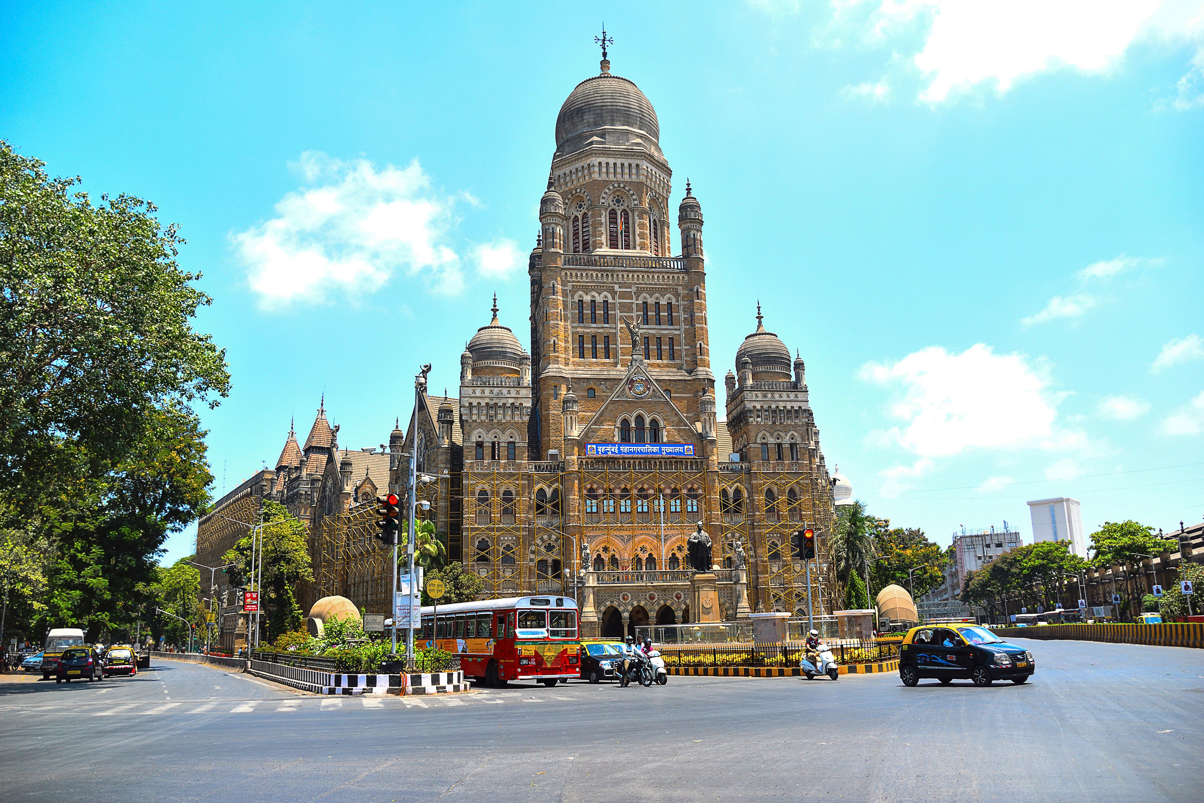 A grand building with multiple domes and intricate architecture.