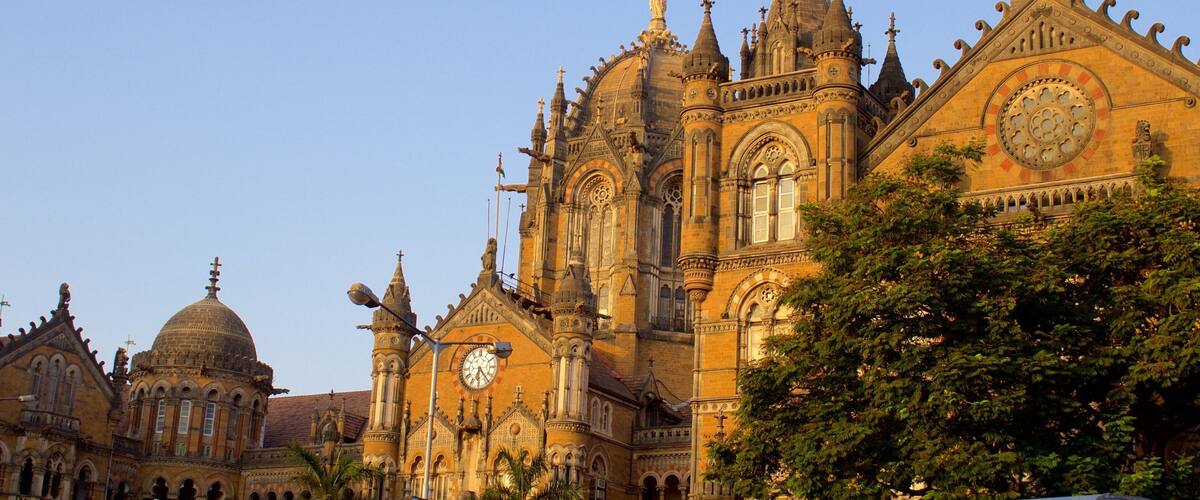 Mumbai which includes heritage elements and a sunset
