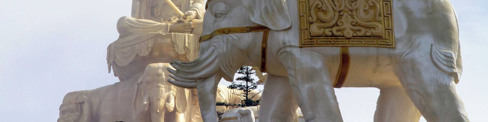 It was an experience to walk up to the Golden Summit and I would highly recommend it. The walk up uses well-designed paths with gradual stairs. We took the cable car up and then walked for a little over 1 km to the Golden Summit Temple.
We arrived at a very rare clear moment where you could view out onto blue skies with clouds below, but it didn't take long for the fog to arrive and the world to completely dissappear around you. Actually made for a very cool moody environment so was quite happy to get to experience both.
#LikeALocal