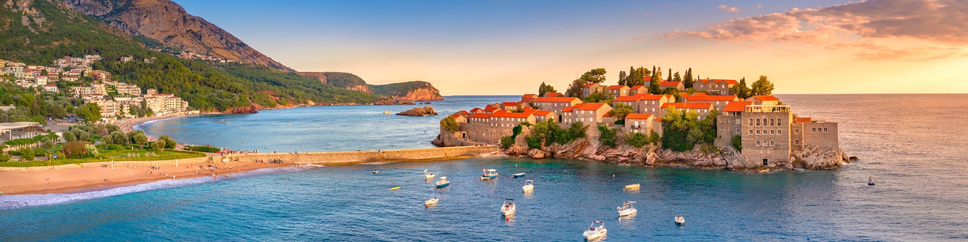 Old town and beach Sveti Stefan sea island, Budva, Montenegro, Europe