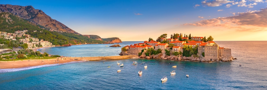 Old town and beach Sveti Stefan sea island, Budva, Montenegro, Europe