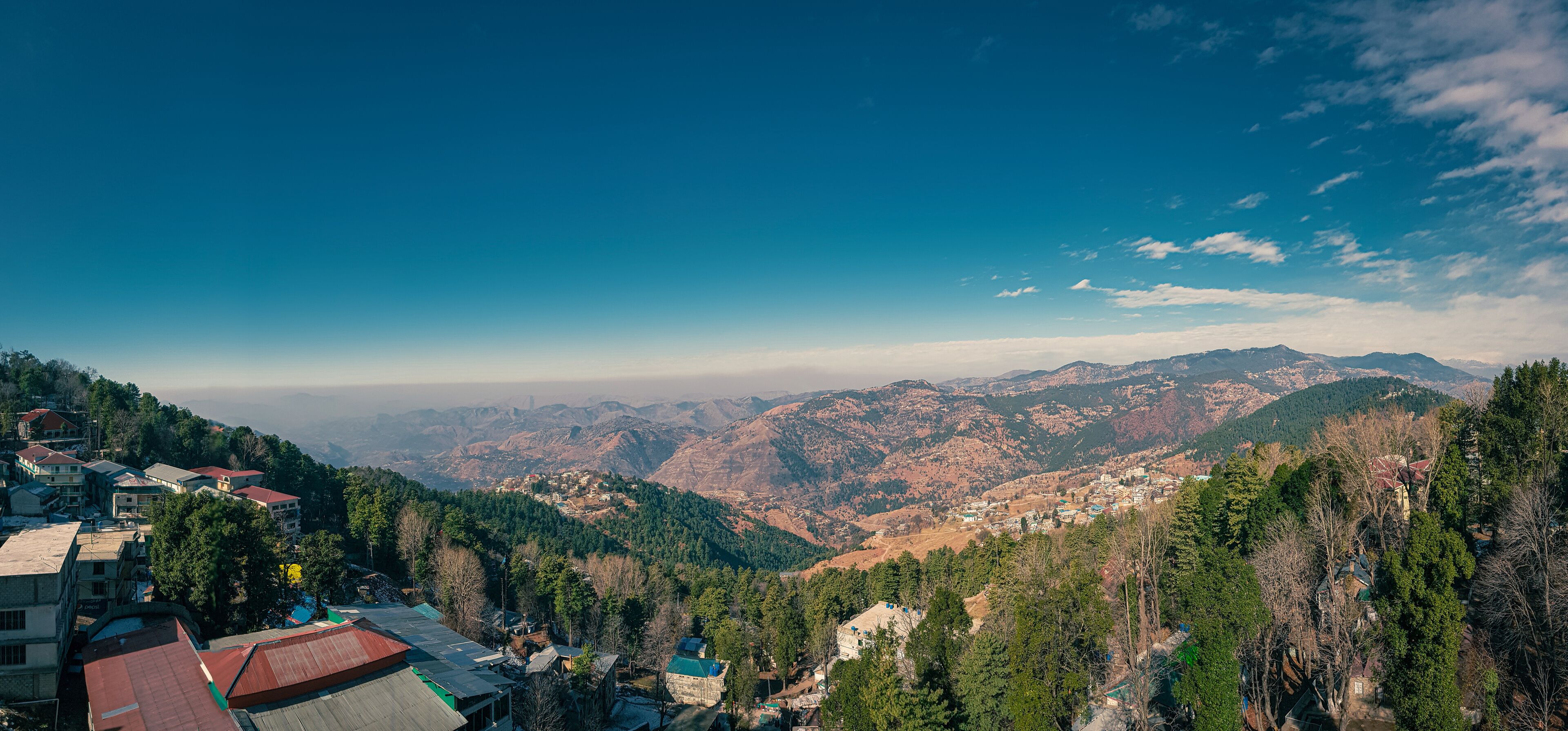 Murree, Punjab, Pakistan - August, 24, 2019: A view from the balcony of Deans Hotel, Murree, Mall Road. I envy those teeny Tiny Hobbit like Houses and People who live in such serene