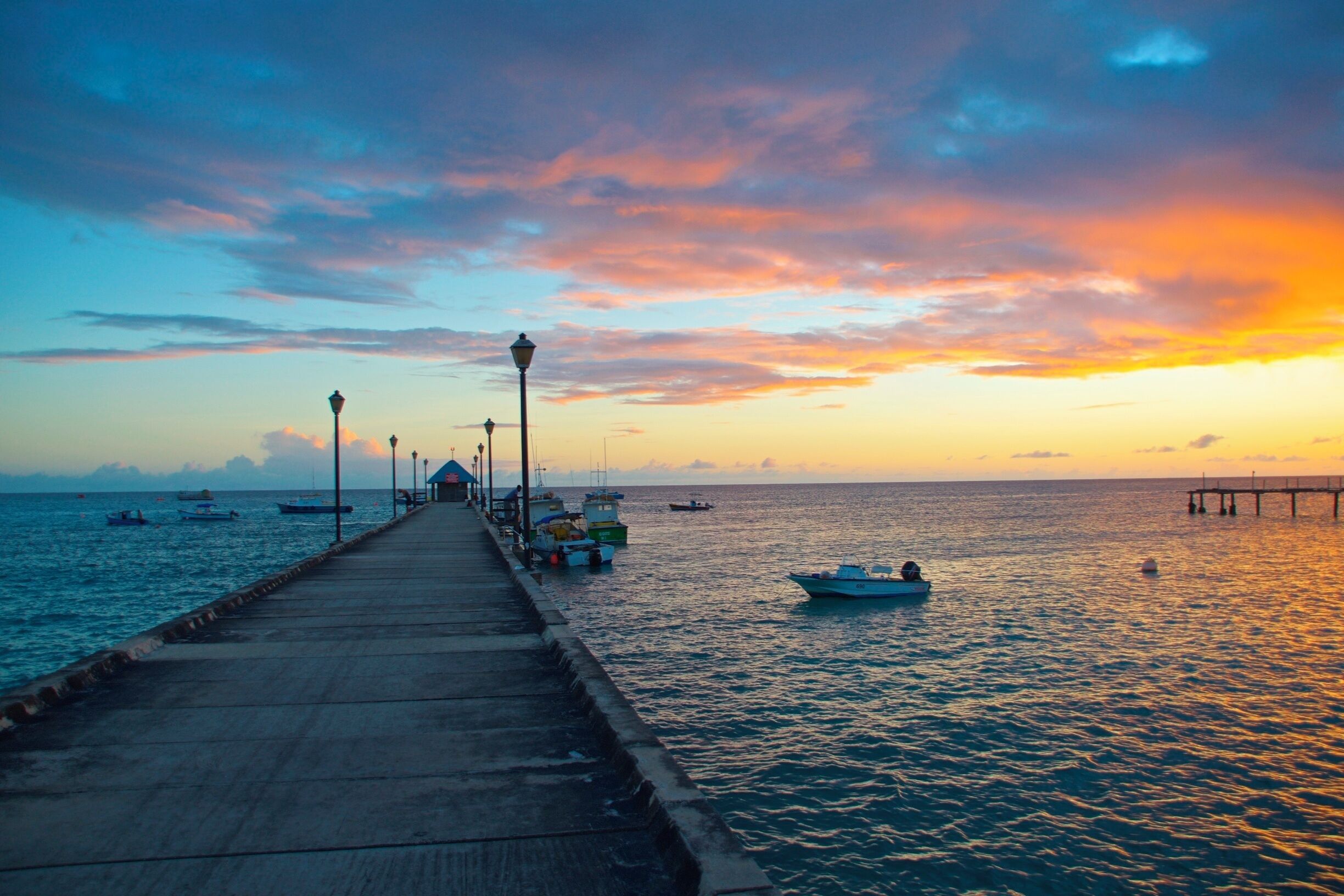 Great fish market with lots of huts selling grilled fish  Friday night is hopping with entertainment.  Any evening at sunset walk along the pier and see the turtles looking for fish scraps.  #BeachBound