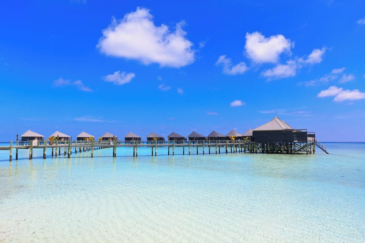 Komandoo Island Resort.

That's the tiny little island we lived and worked for two years.

15 Watervillas have been built over the water.

If you like to read, what we did on a day off on this little gem: http://www.swissnomads.com/2013/08/day-off-komandoo-island-resort-maldives/