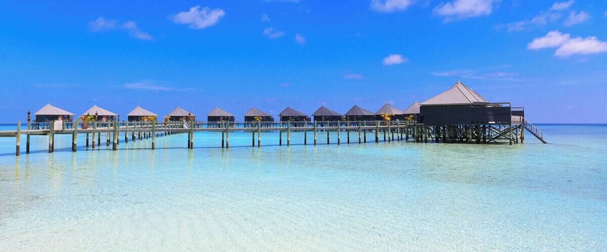 Komandoo Island Resort.
That's the tiny little island we lived and worked for two years.
15 Watervillas have been built over the water.
If you like to read, what we did on a day off on this little gem: http://www.swissnomads.com/2013/08/day-off-komandoo-island-resort-maldives/