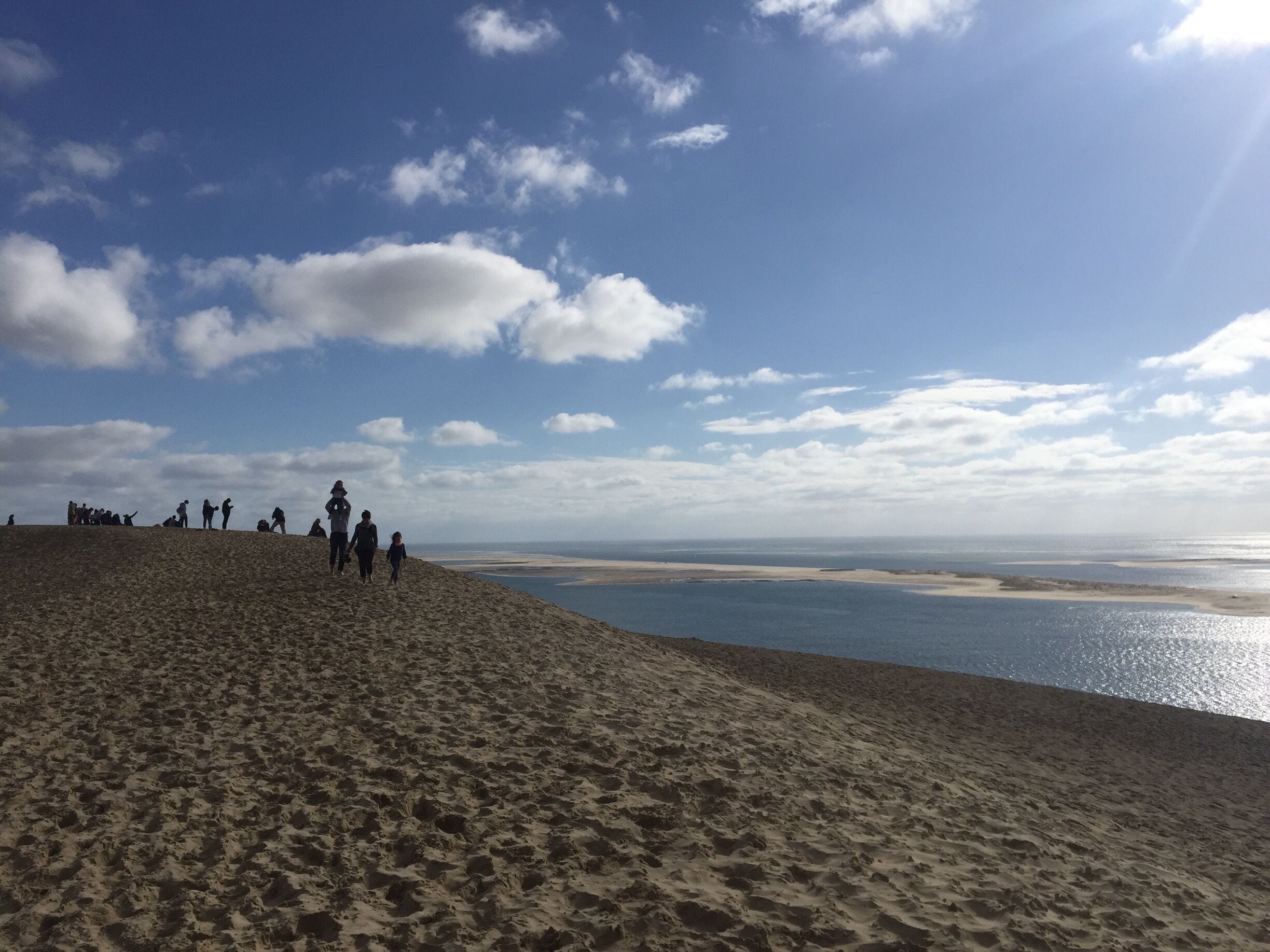 Hiking the dune du Pilat (or Pyla) after a long raining day to discover a beautiful view and the sun who has disappeared all along the day. Question for all the people who has visited the place: stairs or sand?! :)