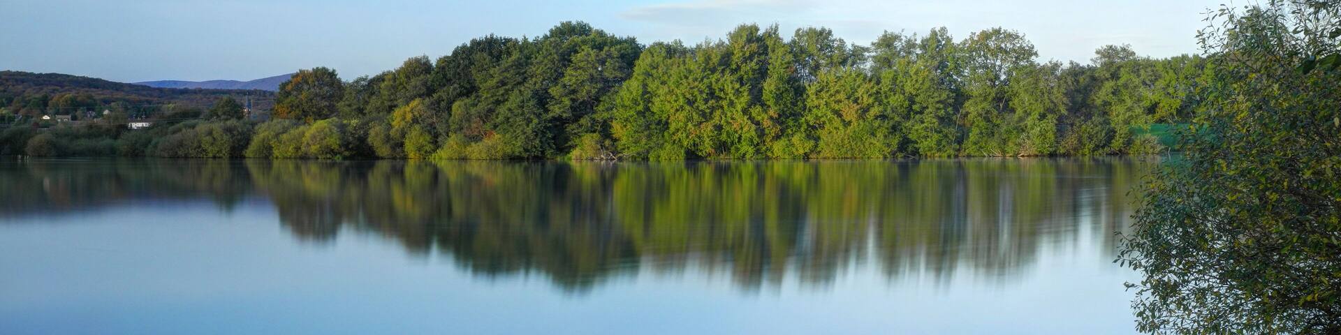 NOTE: This image is a panorama consisting of multiple frames that were merged or stitched in software. As a result, this image necessarily underwent some form of digital manipulation. These manipulations may include blending, blurring, cloning, and color and perspective adjustments. As a result of these adjustments, the image content may be slightly different than reality at the points where multiple images were combined. This manipulation is often required due to lens, perspective, and parallax distortions.