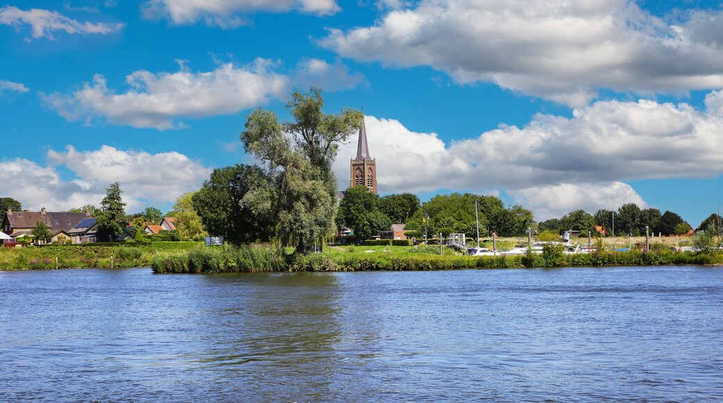 Beautiful river Maas landscape with ancient countryside village - Batenburg, Netherlands (Noord-Brabant), (focus on center)