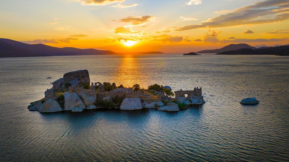 View of Old church building ruins of Heraklia ancient city Bafa Lake of Aegean district at sunset