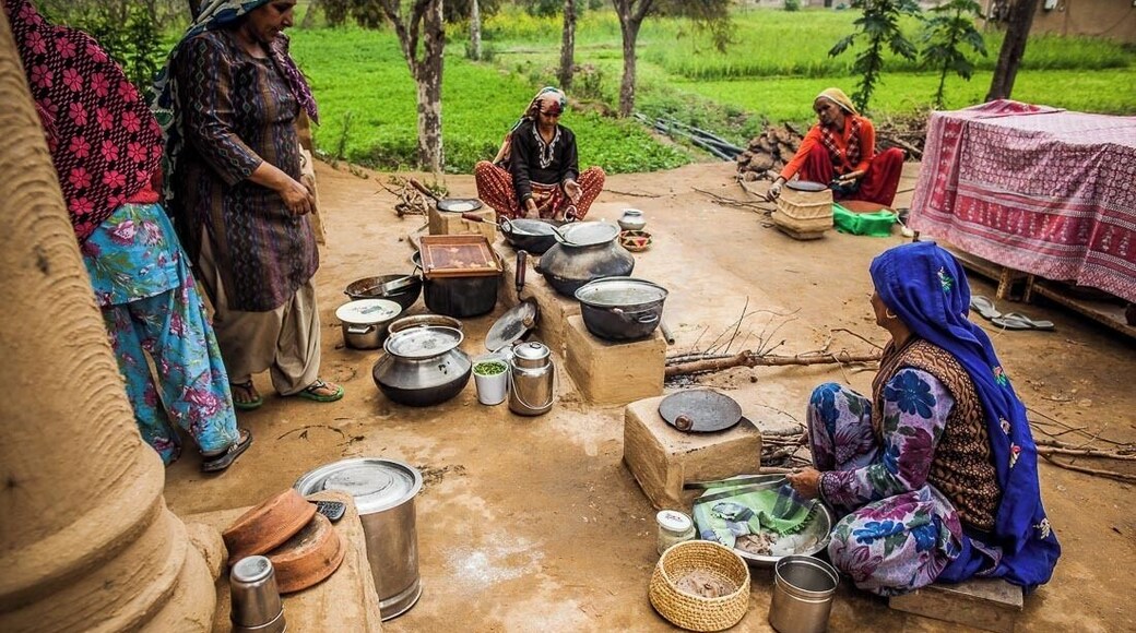 Outdoor lunch preparations, courtesy of the village women at Mangar.
Rotis (chapatis) being cooked over a 'chulha' cooking stove, heated by burning wood, charcoal or cow dung.