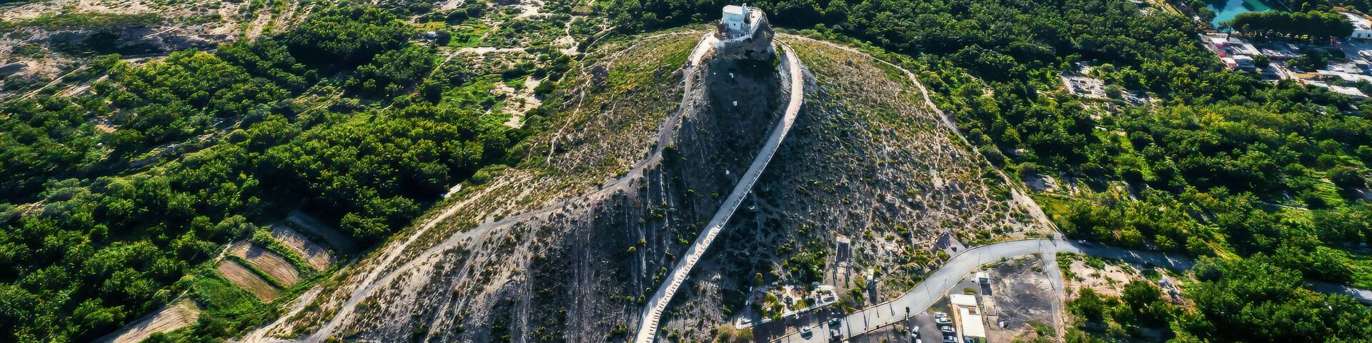 Aerial view of the serene Santo Madero mountain overlooking a picturesque valley and expansive fields, Parras, Coahuila de Zaragoza, Mexico.