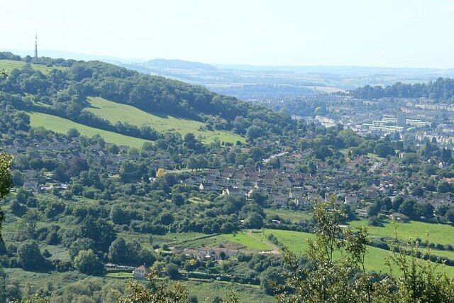 View from Bathford Hill Taken from open ground near Brown's Folly. The local TV transmitter near the left hand edge is at the top of Bathampton Down ST7765 which has Bathampton at its foot. The higher of the two roads in this area is the A36 to Beckington and Warminster. The lower is a local road going to Batheaston via a toll bridge over the River Avon. The hill to the right is the bottom of Lansdown hill, and the countryside between is north Somerset looking toward Farmborough and Pensford.