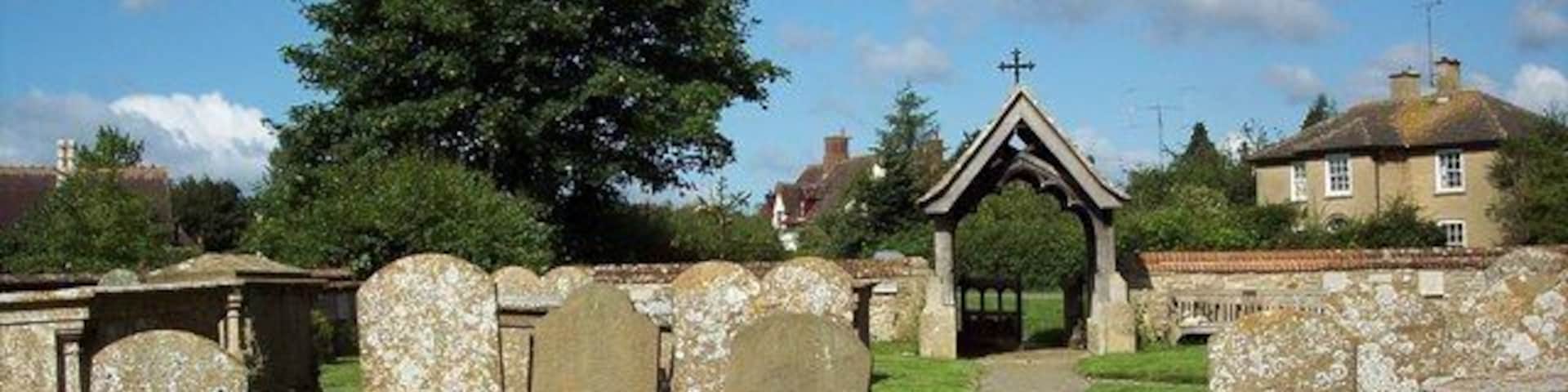 St Mary Magdalene parish churchyard, South Marston: view west from the church