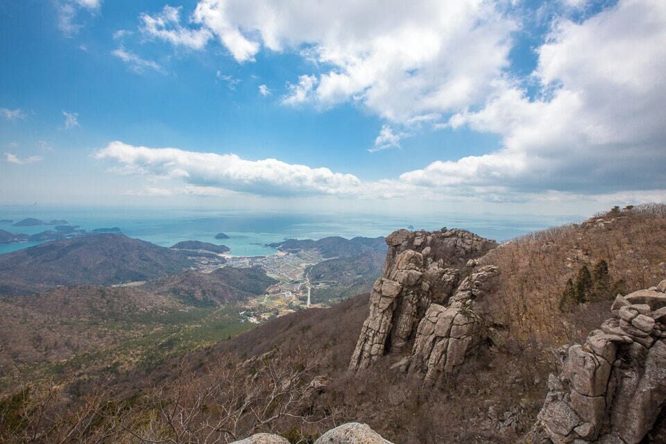 500px provided description: The Mt. Geum is the most famous mountain in the South as Hallyeo Haesang National Park and it is also known as soul mountain.The fantastic rocks and stones of 38 famous spots with many legends look like Mt. Geumgang so it is also known as small Mt. Geumgang or Namhae?s Mt. Geumgang. As Lee Seong-gye, King Taejo, Mt. Bogwang was renamed as Mt. Geum. Next to the Boriam, there are Sambul Rock and Joseon Taejo Prayer Altar. (Scenic spots and places of historic interest No. 39) [#rocks ,#geum ,#Namhae's]