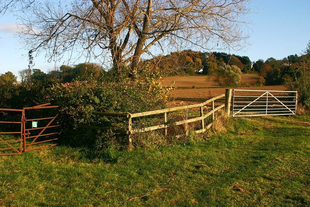 Field Gates near Abbotswood Farm, Brockworth The left gate leads to a public footpath skirting the rapidly developing Gloucester Business Park. The green belt at this point on the edge of the Cotswold Area of Outstanding Natural Beauty is under threat by development both of the Business Park and of the nearby old Brockworth aerodrome.