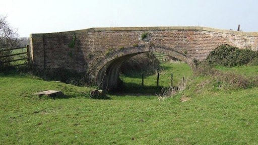 Westfield Bridge An occupation bridge over an infilled section of the Stroudwater Canal. Just in front of the bridge you can see the remains of the Westfield Lock which was blown up during the building of the nearby M5. The keystone reads 1841.