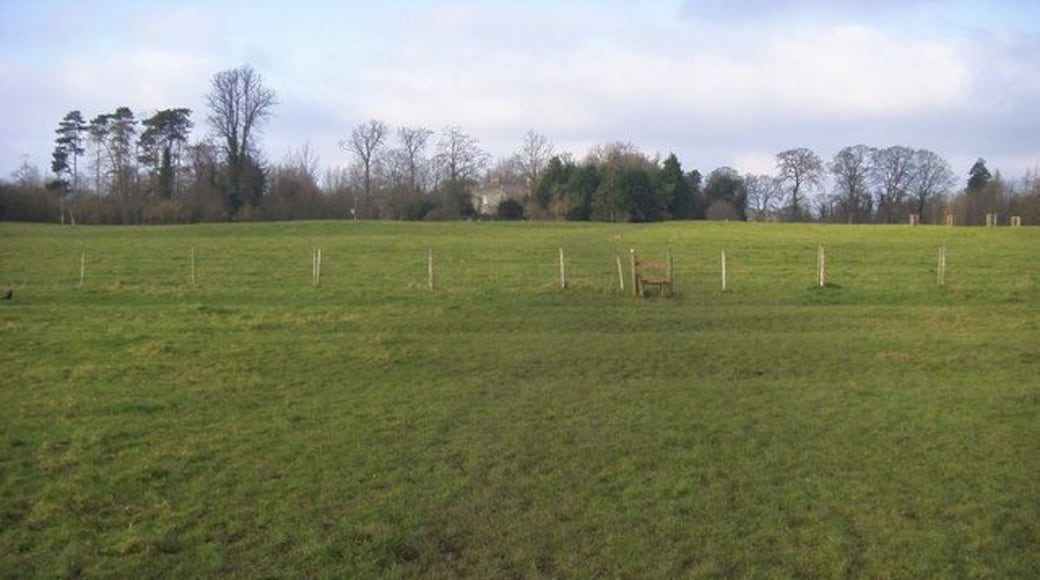 Footpath to Hill House Footpath goes across stile heading towards Hill House behind the trees