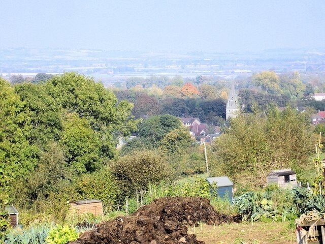 Howe Allotments, Windmill Lane, Wheatley Howe Allotments, Windmill Lane, Wheatley with St. Mary's church in the distance.