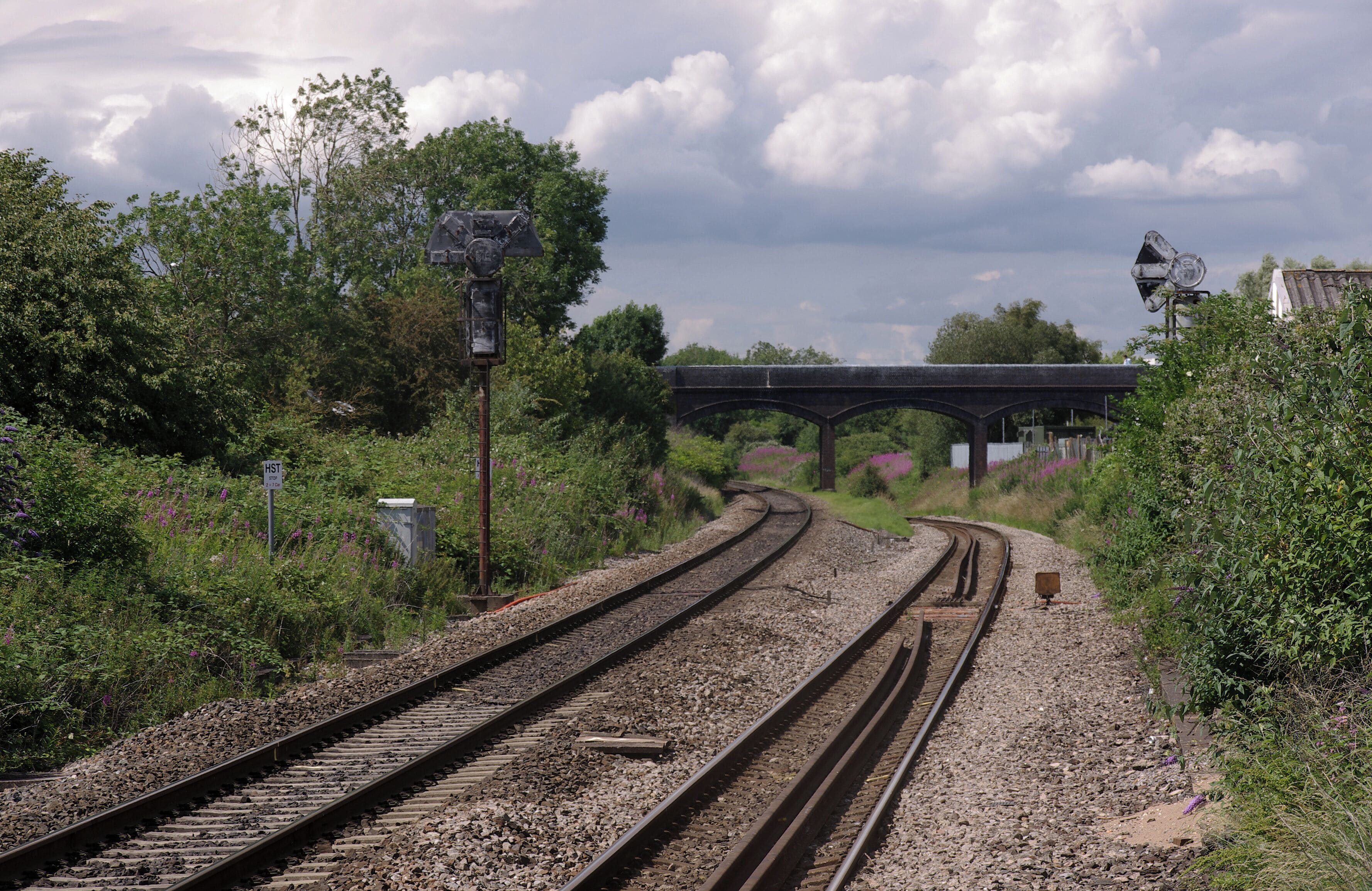 Patchway station, looking westwards from the eastbound platform. The bridge in the distance, despite its construction and appearance, is merely a footpath.