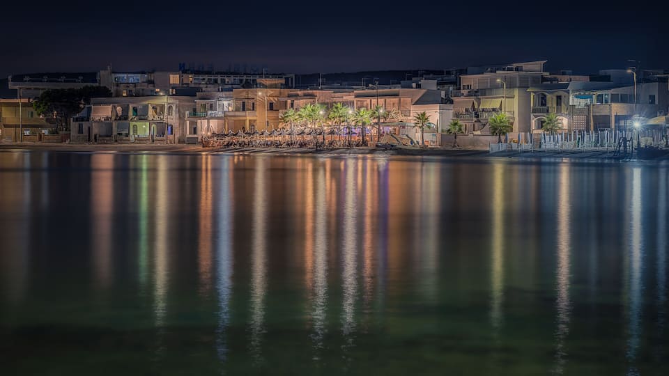 Night Reflections of a Waterfront Village in Puglia