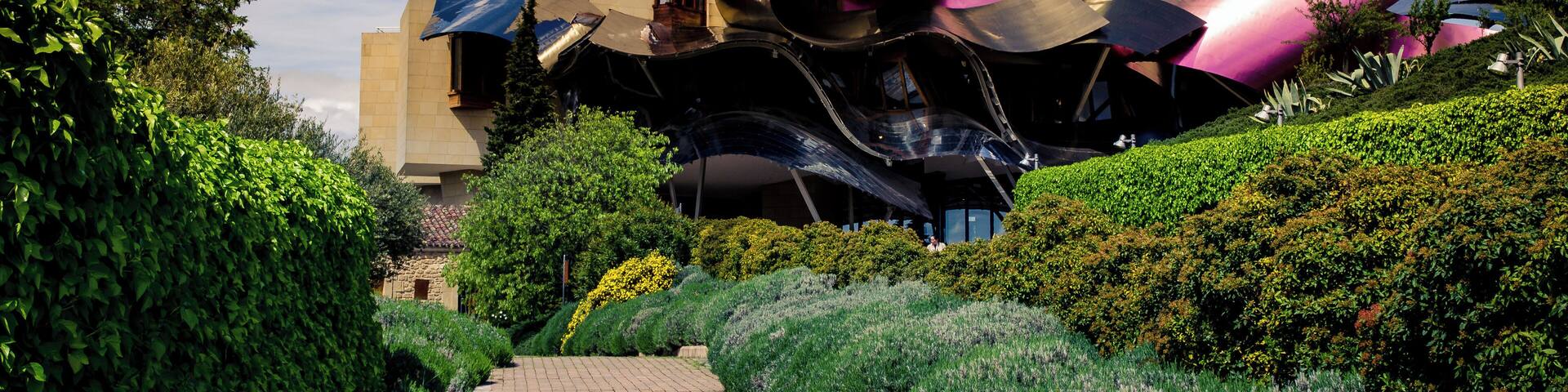 The Frank Gehry-designed hotel in the midst of the Marques de Riscal vinyards. A winery tour and tasting and the chance to see this stunning architecture up close make this a worthwhile stop.