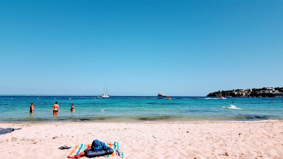 Palmanova is not so far from Palma de Mallorca and you could find a nice beach and a lot of beach volley fields !