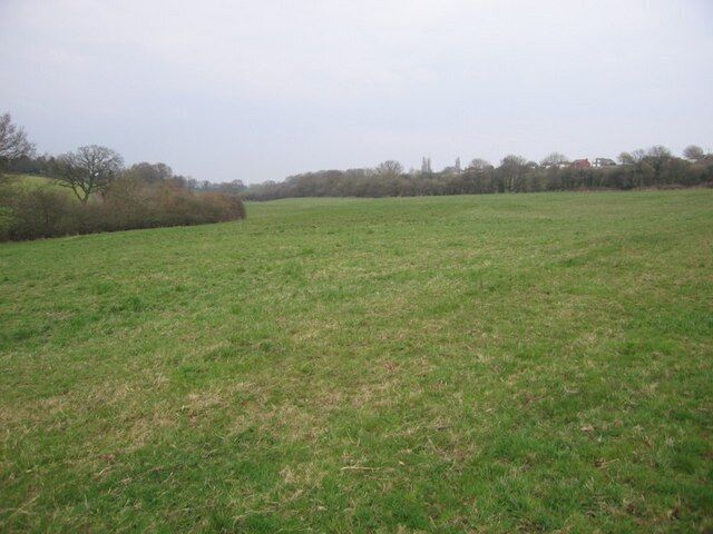 Field I would have taken a picture of the river flowing behind the trees on the left, but it was not pretty. The water itself looked coloured as if it were the run off from a farmyard. It also contained much debris like tyres and a keep left bollard.