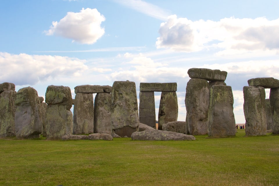 Stonehenge, a prehistoric monument with large standing stones arranged in a circular layout.
