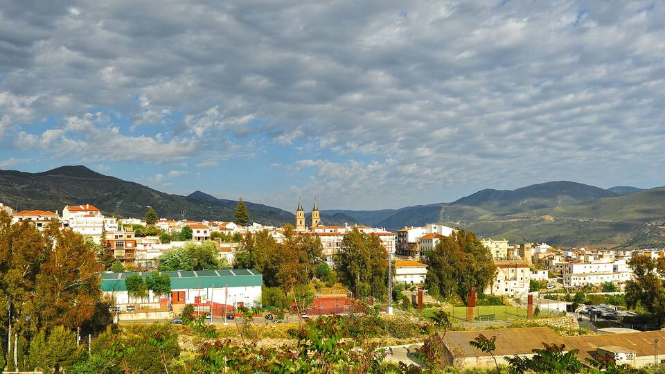 Panoramic view of Órgiva, village of the famous region of the Alpujarras in the province of Granada, Andalusia, Spain