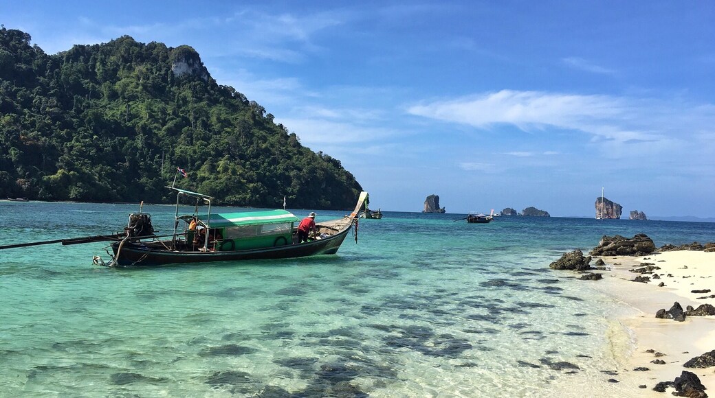 If you go to Krabi or Phuket, Thailand rent a private long-tail boat and head to islands that aren't frequented by so many tourists. You still have to hit some of the more traveled islands... They are on the beaten path for a reason. This is Tup Island with our long-tail boat.
#BeachBound