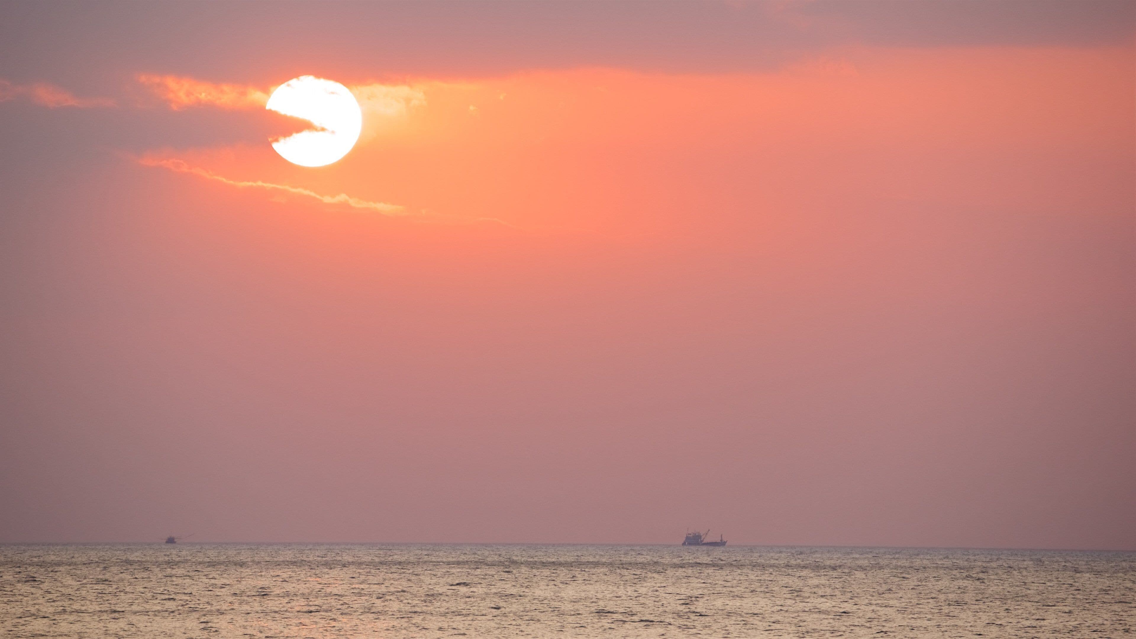 Karon Beach which includes a sunset and general coastal views