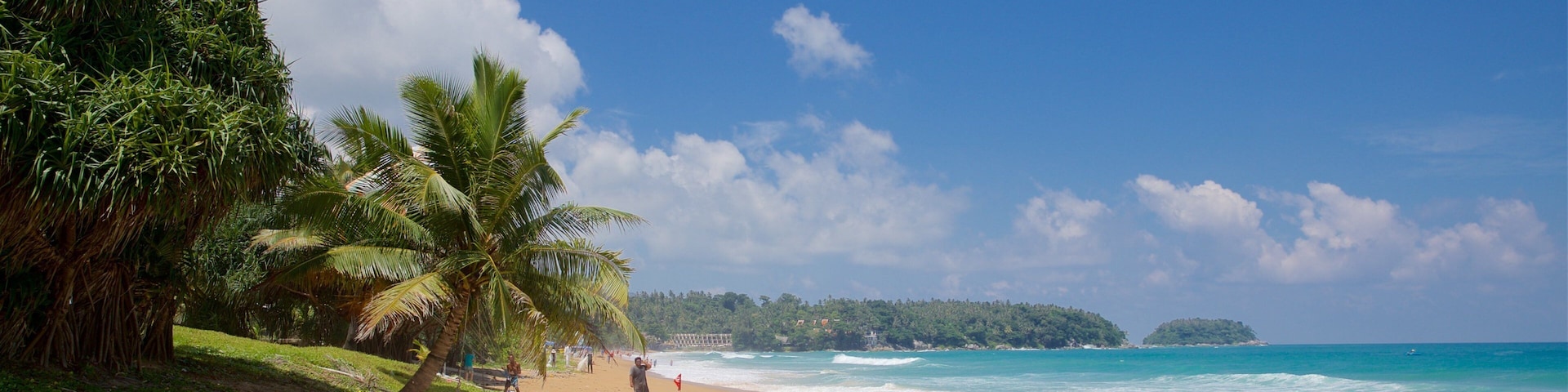 Karon Beach featuring a beach, tropical scenes and general coastal views