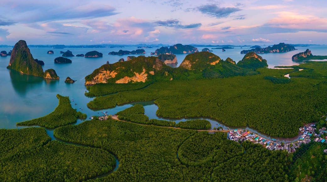Sametnangshe, view of mountains in Phangnga Bay with mangrove forest in Andaman Sea with evening twilight sky, travel destination in Phangnga, Thailand