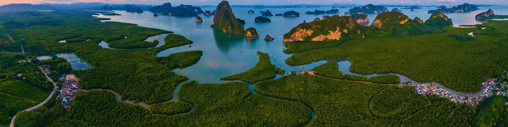 Sametnangshe, view of mountains in Phangnga Bay with mangrove forest in Andaman Sea with evening twilight sky, travel destination in Phangnga, Thailand