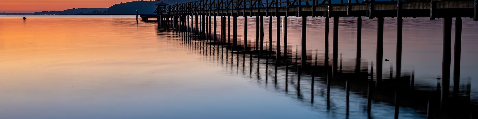 Pier in Harrislee, Flensburg, Baltic Sea at sunrise