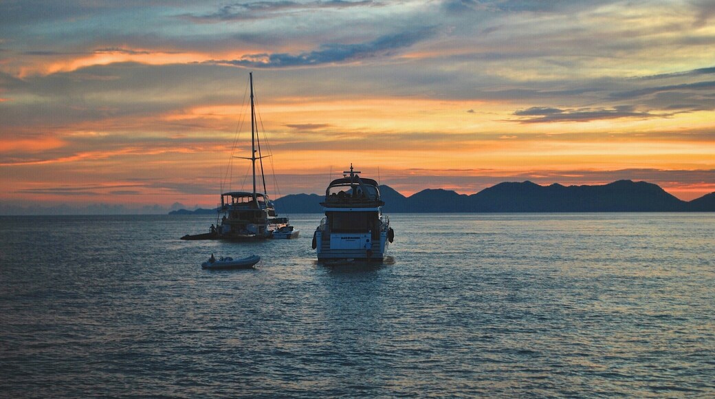 A beautiful sunset over the islands of Krabi Province (specifically, Koh Hong) in Phuket, Thailand.
This photo is taken on the day that I lost my GoPro. I "idiotically" jumped off the boat with my GoPro and didn't have any strap attached to it. To be fair, I had the camera with me when I reached the surface of the water but because of the impact, I accidentally (read it as idiotically) let go of my camera. *insert crying emoticon here*. But being a perpetual optimist that I am, I had to tell myself that I still had a great day and fortunate to have this scenery around me. We were so amazed by the scenery that we sat on the boat deck even after the light has gone because we felt so lucky and blessed for being able to witnessed something so beautiful.
Not gonna lie though, I wished I had my GoPro to timelapse the sunset. *insert more crying emoticon here*
TOP TRAVEL TIP: Buy a strap for your GoPro or a floatie attached to it, so when you jump off a boat, you wouldn't lose your camera.
#krabi #kohhong #phuket #thailand #southeastasia #asia #travel #wanderlust #island #islandhopping #sunset