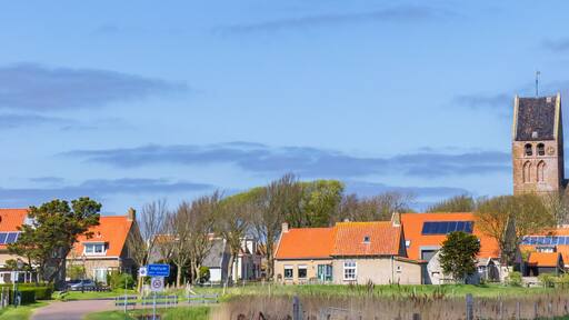 Panorama of the church in the historic village of Hollum, Ameland, Netherlands