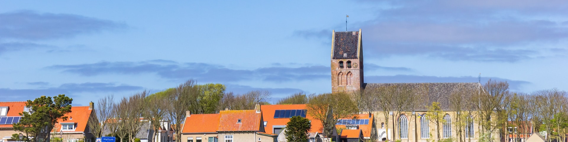 Panorama of the church in the historic village of Hollum, Ameland, Netherlands