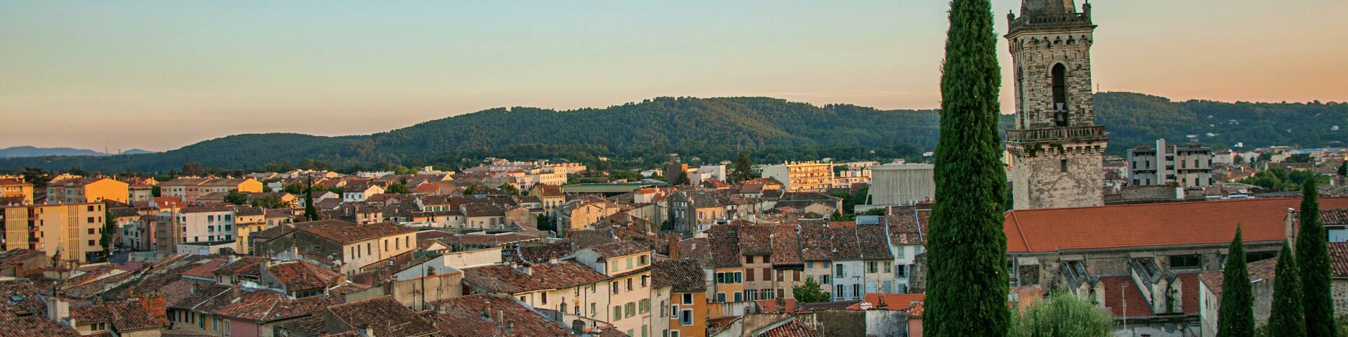 View of the graceful town of Draguignan from the hill of the clock tower under the colorful light of the sunset. Located in the Provence region, Var department, southeastern France