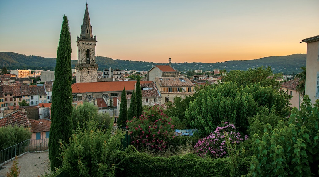 View of the graceful town of Draguignan from the hill of the clock tower under the colorful light of the sunset. Located in the Provence region, Var department, southeastern France