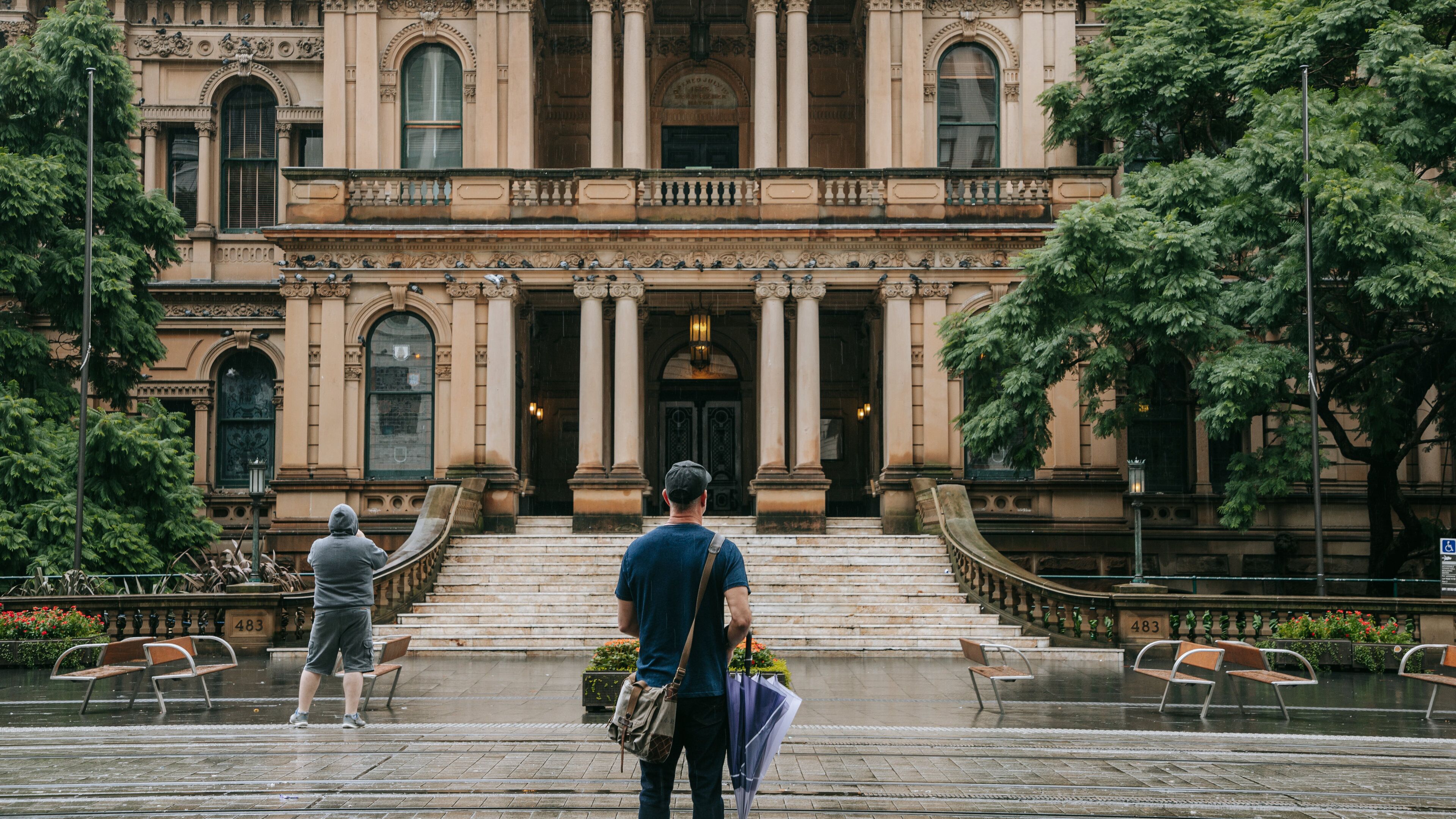 Sydney Central Business District showing heritage architecture and street scenes as well as an individual male
