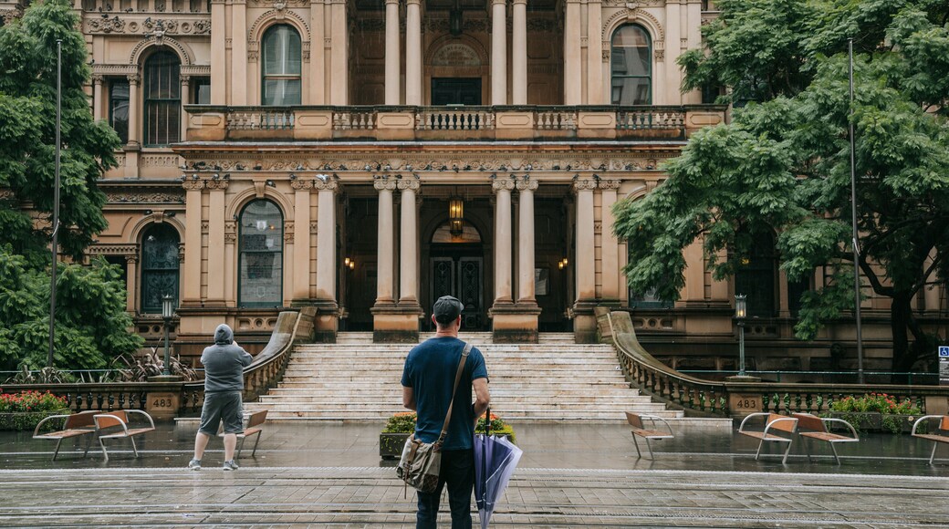 Sydney Central Business District showing heritage architecture and street scenes as well as an individual male
